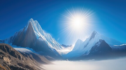 Majestic snow-capped mountains under a bright sun