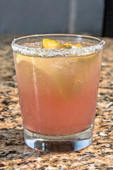 Guava margarita cocktail in a salt-rimmed glass, refreshing tropical drink, traditional cocktail