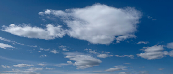 Sky panorama, the sky is blue, many clouds. clouds are white and fluffy.  sky is very clear and bright.