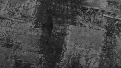 A painting with a black  white background and red and brown splatters. painting has a rough, textured appearance, giving it a sense of depth and dimension