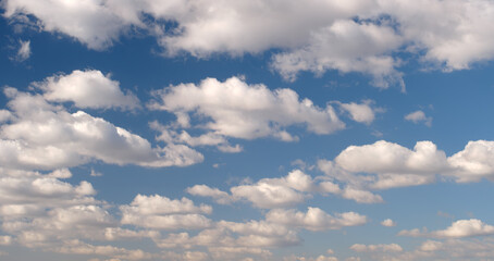 Sky panorama, the sky is blue, many clouds. clouds are white and fluffy.  sky is very clear and bright