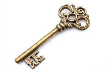 Close up of an ornate vintage key lying on a white surface
