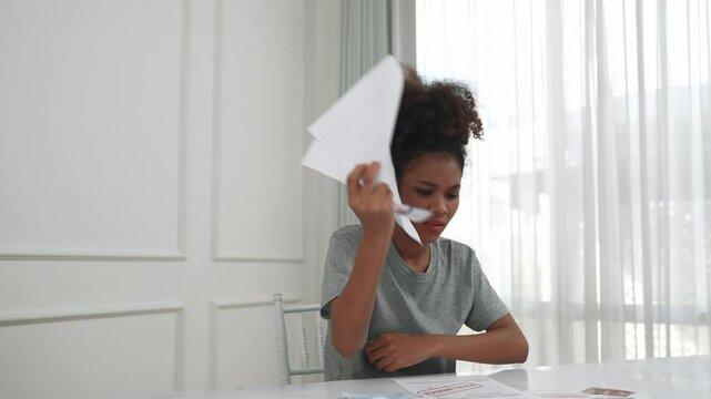 Stressed young woman has financial problems with credit card debt to pay crucial show concept of bad personal money and mortgage pay management crisis.