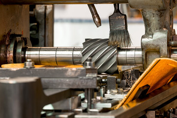 Close up view of old horizontal milling machine with metal cutter