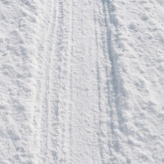 Obraz premium Pristine Snow-Covered Paths: Serene Winter Landscape with White Texture and Icy Trails