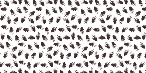 scatter seamless pattern with beaver footprint for textile, wallpaper and other. animal footprints repeat background © Zeronineee