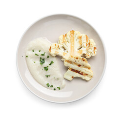 Plate with grilled cauliflower steaks and puree on white background