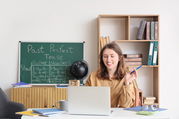 Female teacher conducting English lesson online