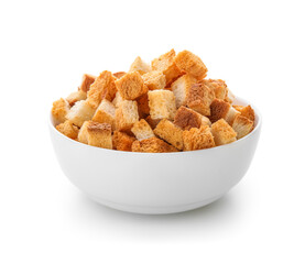 Bowl with crunchy croutons on white background