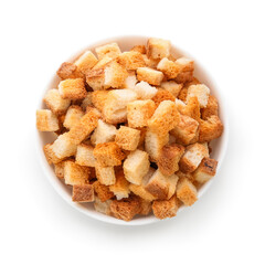 Bowl with crunchy croutons on white background