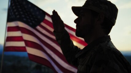 Silhouette Of A Soldier Salutes In Front American Flag At Sunset Memorial Day