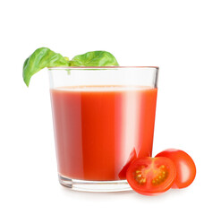 Glass of fresh tomato juice with basil on white background