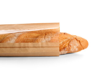 Paper bag with fresh baguette on white background