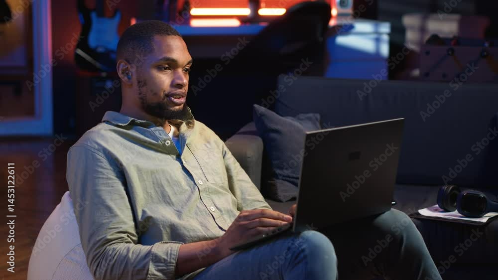 Poster black man joining online lesson to work on new skills from home space, attend web conference call an