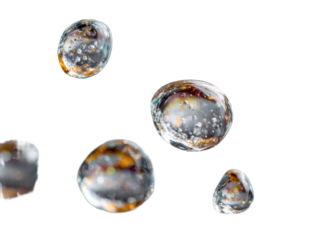 Top spiral of floating droplets highlighting surface tension