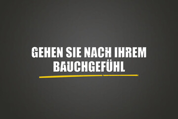 Fototapeta premium Gehen Sie nach Ihrem Bauchgefuehl (Go with your gut feeling) - A blackboard with white text.