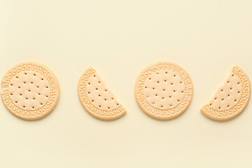 Sweet cookies on yellow background