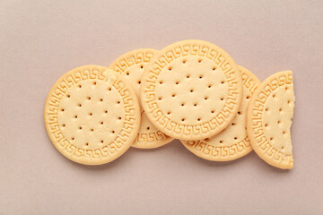 Sweet cookies on beige background