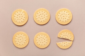 Sweet cookies on beige background