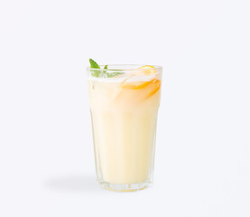 Iced creamy lemonade with citrus and mint