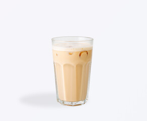 Iced coffee with milk in tall glass cup