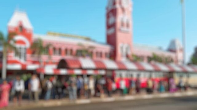 Bokeh view of people at Chennai Central railway station. Blurred background footage.