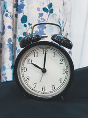 An alarm clock showing the time