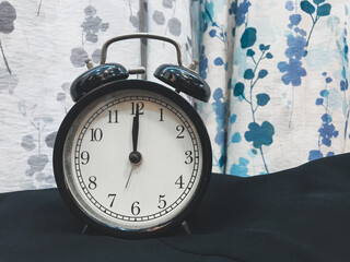 An alarm clock showing the time