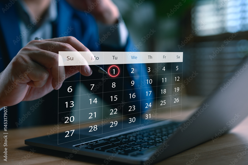 Poster businessman scheduling a digital calendar on laptop, highlighting the first of the month, symbolizin
