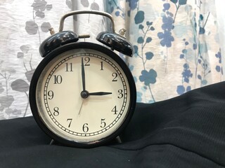 An alarm clock showing the time