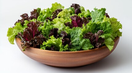 Fresh mixed greens in a wooden bowl ready for a healthy salad meal preparation