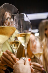 Friends toasting with champagne flutes at a celebration