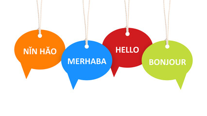 Paper speech bubbles with greetings in different languages hanging on white background. Banner design © New Africa