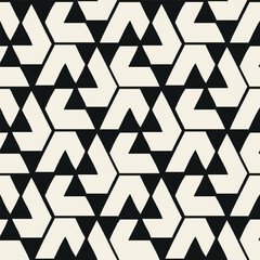 Vector seamless geometric pattern featuring bold angular shapes and hexagon-inspired forms. The black and white contrast enhances the crisp
