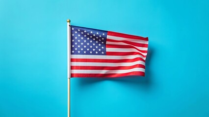 Fototapeta premium American flag on bright blue background, patriotic symbol of the United States