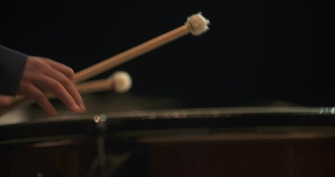 Close-Up of Musician Playing Timpani