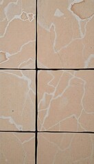 Fototapeta premium close up of a tile wall with white paint