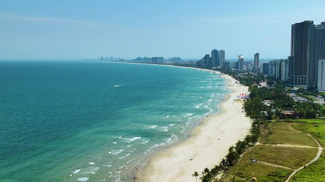 Vietnam Da Nang City - Sandy Sea Beach - Windy Sunny Day - Aerial Skyline View - 4K