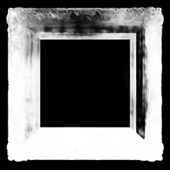 Ornate vintage picture frame in monochrome with decorative carvings and black background for display