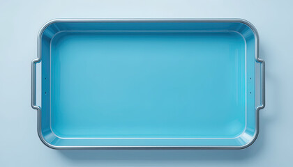 High-angle,  shot of an empty, light-blue rectangular tray set against a pale background. The tray appears to be made of metal with a light-blue interior and silver exterior.