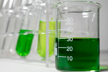 green chemistry beaker and test tube