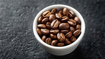 Fototapeta premium Coffee cup. Roasted coffee beans in white cup at dark table. HD 8K wallpaper Photographic Image 