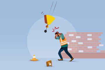 Accident at construction site. Construction heavy equipment accidentally hit on worker head. Safety first, accident awareness and unsafe workplace in construction industry concept. © Kate3155