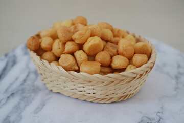 The snacks are uniform in size and appear to be deep-fried, giving them a crispy texture