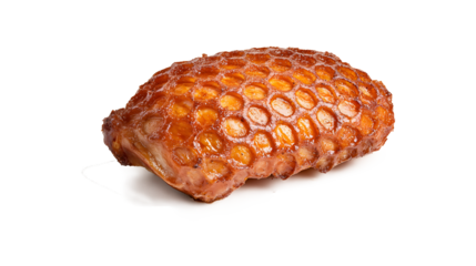 Roasted pork knuckle crispy golden skin cross hatched pattern glistening juicy meat