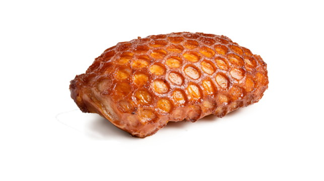 Roasted pork knuckle crispy golden skin cross hatched pattern glistening juicy meat