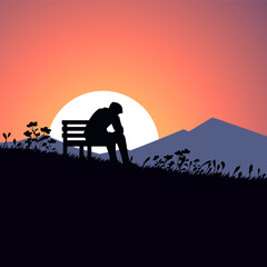 A man sits on a bench in a field with a sunset in the background