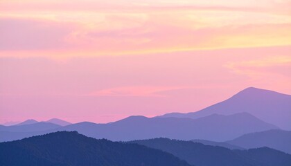 Obraz premium Pastel Pink Purple Mountain Range at Sunset