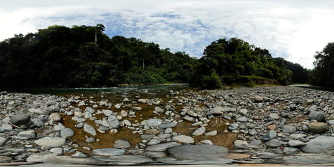 A river in the middle of the jungle in a famous tourist spot Bukit Lawang. Sumatra, Indonesia. Virtual Reality 360.