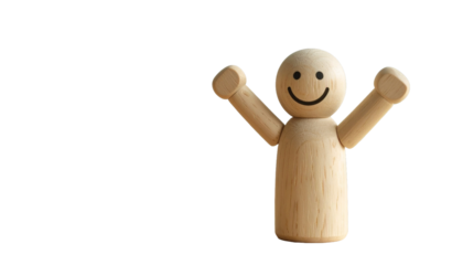 A wooden figure stands with its arms raised in a gesture of joy and celebration, showcasing a happy face